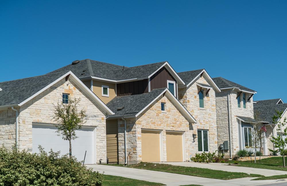 Modern houses in an Austin suburb with Texas limestone exterior