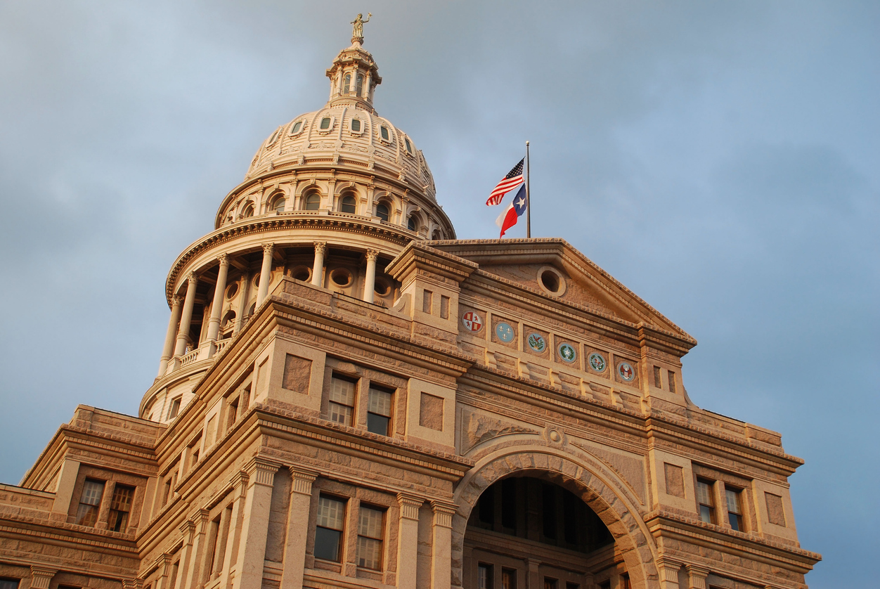 Texas Capitol at sunset on a cloudy day