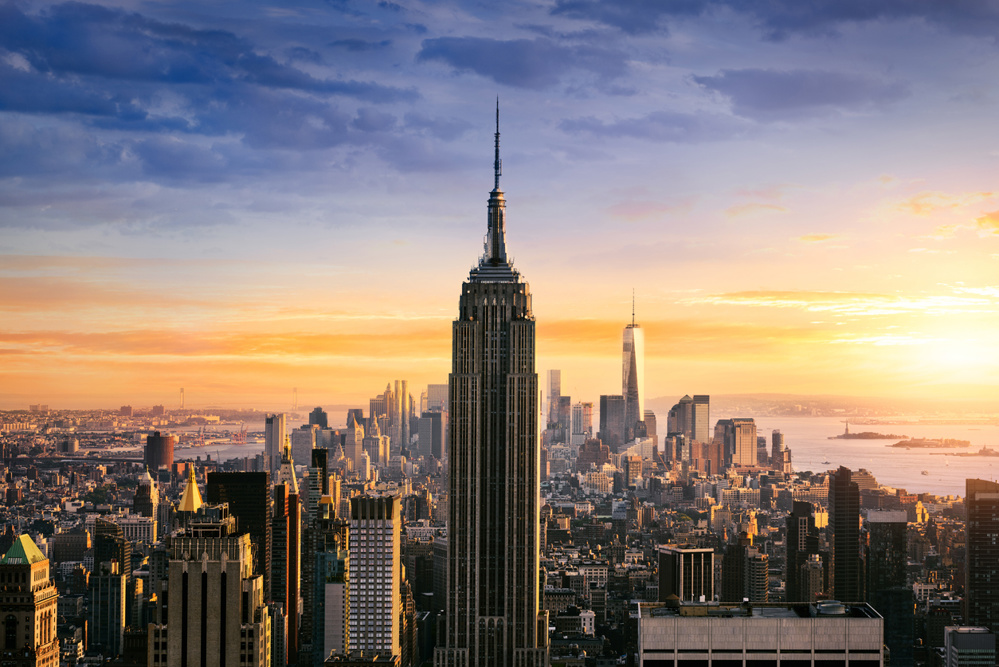 New York City skyline with urban skyscrapers at sunset, USA