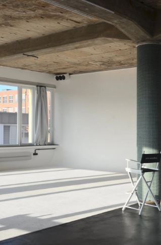 spacious-light-studio-with-chair